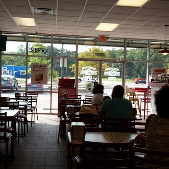 Firehouse Subs - two people sitting in a restaurant - Fast Food Near Me - Augusta, Georgia