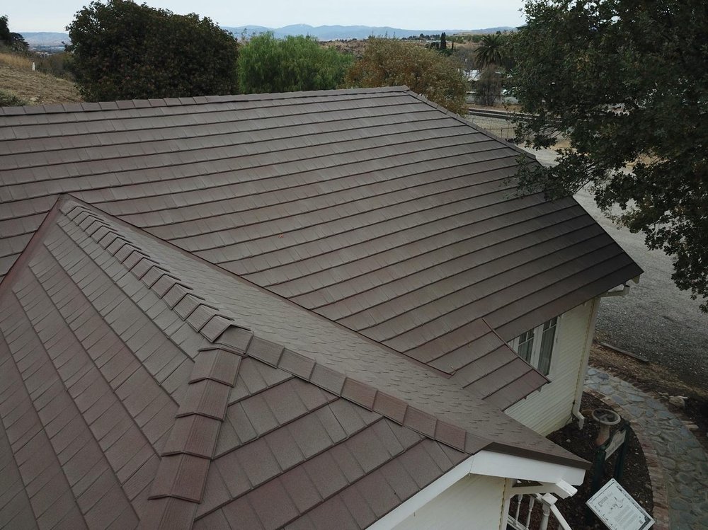 Slide of Kona Roofing Experts