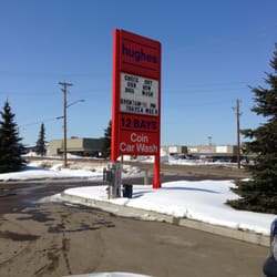 Hughes Car Wash - Sign out front