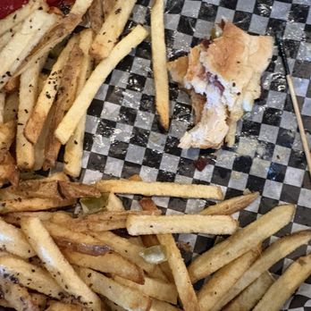 JL Beers - An almost devoured jalapeño chicken sandwich - Burgers Near Me - Burnsville, Minnesota JL Beers - An almost devoured jalapeño chicken sandwich - Burgers Near Me - Burnsville, Minnesota