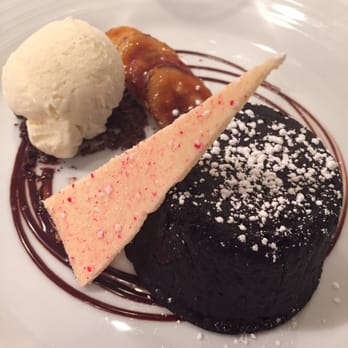 Atlantic Grill - Molten chocolate cake with vanilla ice cream - New American Near Me - New York, New York Atlantic Grill - Molten chocolate cake with vanilla ice cream - New American Near Me - New York, New York