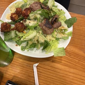 Quaker Steak & Lube - Garlic Cheese Curd Caesar Salad with Steak - American Near Me - Cleveland, Ohio Quaker Steak & Lube - Garlic Cheese Curd Caesar Salad with Steak - American Near Me - Cleveland, Ohio
