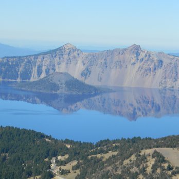 Scotts Peak - telephoto view of Crater lake and Wizard island from trail - Hiking Near Me Scotts Peak - telephoto view of Crater lake and Wizard island from trail - Hiking Near Me