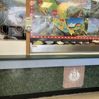 El Charro Mexican Store - Pick up window with toppings and salsa. - Mexican Near Me - Georgetown, Delaware