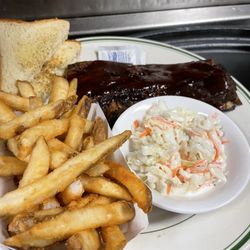 Mr B's Roadhouse - Half rack of Roadhouse Baby Back Ribs served with fries coleslaw and Texas toast