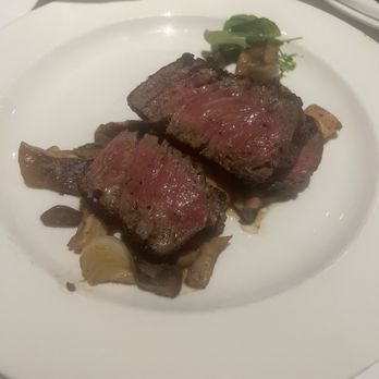 The Capital Grille - Sliced Filet Mignon with Cipollini Onions, Wild Mushrooms and Fig Essence - Steakhouses Near Me - Dunwoody, Georgia
