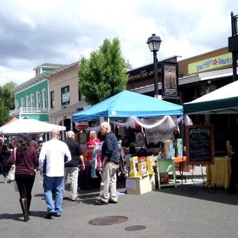 Folsom Antique Fair - a crowd of people walking down the street - Antiques Near Me - Folsom, California