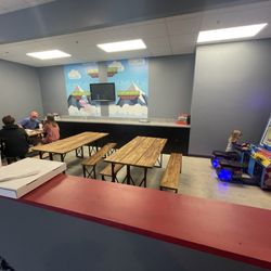 Basecamp Arcade - Famous Yeti's Pizza - Side area where you can eat pizza inbetween all of the game play