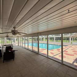 Vision Aluminum And Glass Specialists - Custom impact sliding glass dor installed in pation after