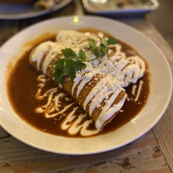 Zona Rosa - ENCHILADA DE POLLO rockys free range chicken, mole colorado, queso, crema - Mexican Near Me - San Jose, California
