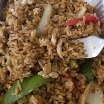 Mango Thai - Ordered "chicken" basil fried rice. These two tiny specks of "chicken" were the only chicken pieces we could find. - Thai Near Me - West Newton, Massachusetts Mango Thai - Ordered "chicken" basil fried rice. These two tiny specks of "chicken" were the only chicken pieces we could find. - Thai Near Me - West Newton, Massachusetts