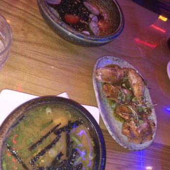 Lucky Robot Restaurant - Shrimp dumplings, miso and seaweed salad. - Sushi Bars Near Me - Austin, Texas Lucky Robot Restaurant - Shrimp dumplings, miso and seaweed salad. - Sushi Bars Near Me - Austin, Texas