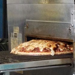 Best Pizza Dairy Bar - As the meatlovers comes through the cooker! Amazing!!
