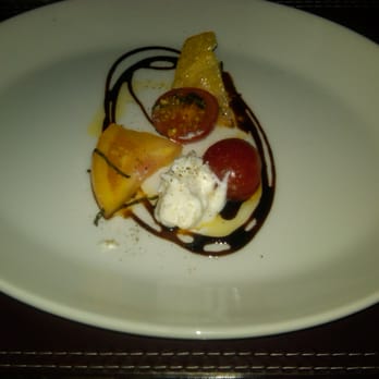 Black+Blue Vancouver - a complimentary tomato salad, with mascarpone cheese and balsamic vinaigrette. - Steakhouses Near Me - Vancouver, British Columbia