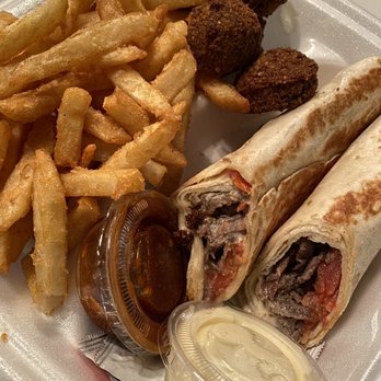Shawarma Press - Beef Shawarma Wrap, Shawarma Fries, Falafel Bites 5pc, hot sauce, Garlic Side Sauce - Mediterranean Near Me - Irving, Texas Shawarma Press - Beef Shawarma Wrap, Shawarma Fries, Falafel Bites 5pc, hot sauce, Garlic Side Sauce - Mediterranean Near Me - Irving, Texas