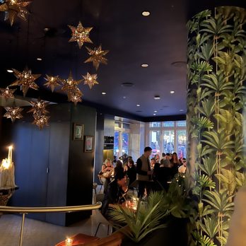 Monarca - a group of people sitting in a restaurant - Mexican Near Me - Vancouver, British Columbia