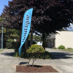 Tsunami Beach - Boutique sign in front of Tsunami Beach Company.