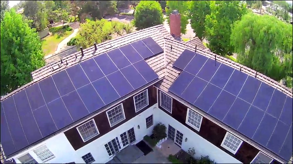 Slide of Green Shield Roofing