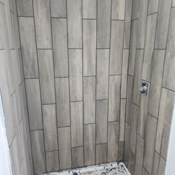 Mason Construction and Custom Renovation - Progress on tile ... black grout!!