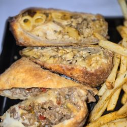 Honey Drizzle - Steak and cheese and the Mac n cheese jerk chicken egg rolls was so amazing 10/10