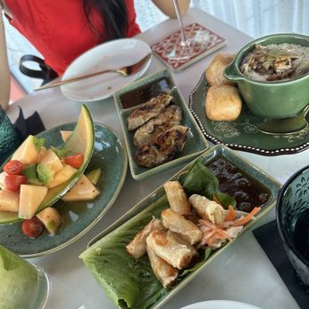 IKTO - Mini egg rolls Cantaloupe salad  Artichoke dip  Lobster dumplings - Cocktail Bars Near Me - Houston, Texas