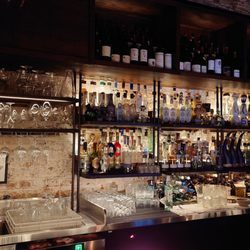 Esteban - Seated at the bar counter.