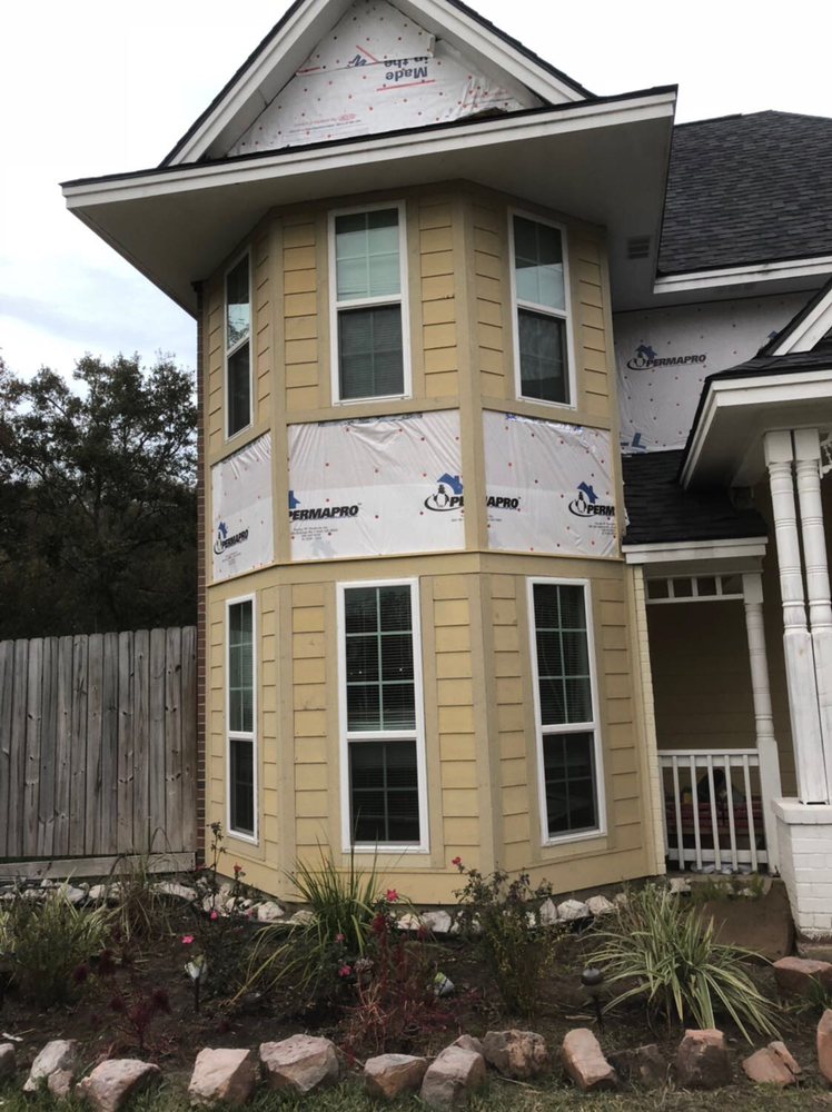 Slide of Champ Vision Roofing Services