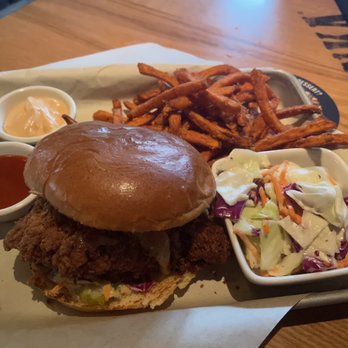 BJ's Restaurant & Brewhouse - New BJ's Kickin' Chicken Sandwich with sweet potato fries. - Breweries Near Me - Columbia, South Carolina