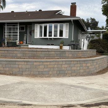Domingo Landscaping - Retaining wall from street side - Tree Services Near Me