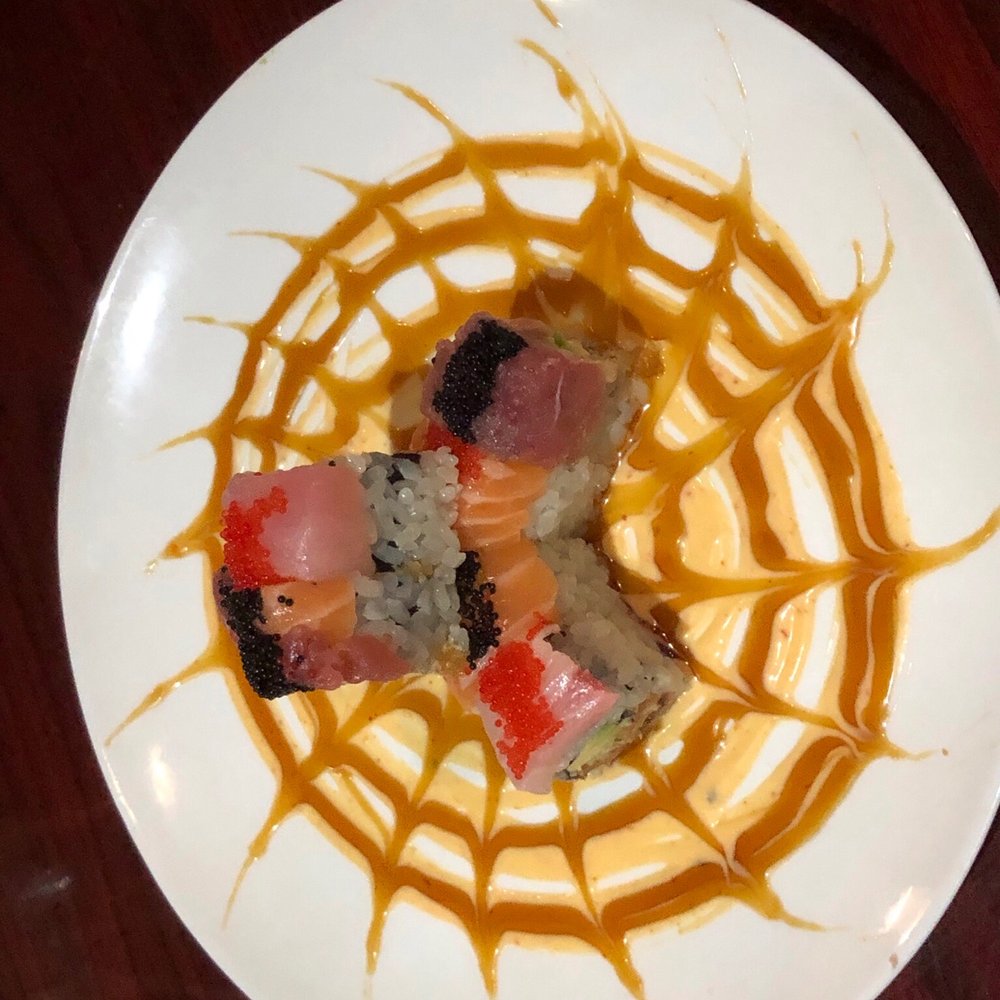 Hinode - Black Widow Roll. That spiderweb sauce was addicting! - Japanese Near Me - Oviedo, Florida Hinode - Black Widow Roll. That spiderweb sauce was addicting! - Japanese Near Me - Oviedo, Florida