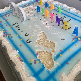 Moreno's Bakery - a birthday cake with candles - Bakeries Near Me Moreno's Bakery - a birthday cake with candles - Bakeries Near Me