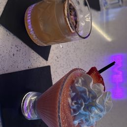 Olive sour whiskey and strawberry makoli Olive sour whiskey and strawberry makoli