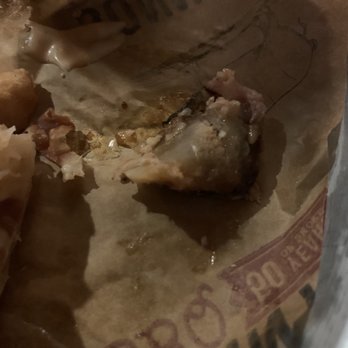 Sonny's BBQ - Bone the size of a quarter in my Red Neck Eggroll. - Barbeque Near Me - Alachua, Florida