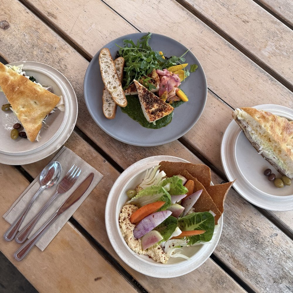 Standard Fare - pork and cabbage sandwich, hummus mezze plate, ricotta plate - Coffee & Tea Near Me - Berkeley, California
