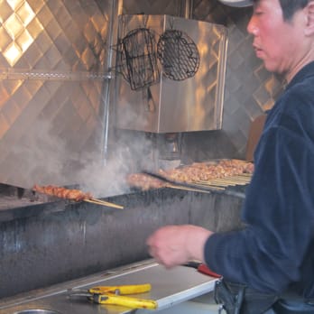 Mongolian BBQ Cart - Man at the grill - Food Stands Near Me - Flushing, New York