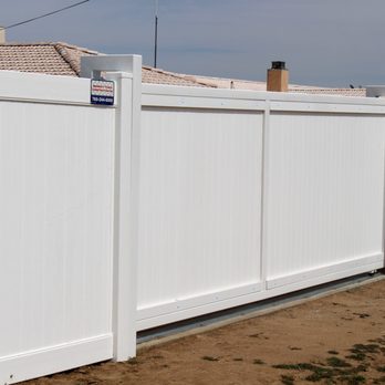 Marriott Fence Construction - A beautiful white vinyl slide gate with a steel frame - Fences & Gates Near Me - Hesperia, California Marriott Fence Construction - A beautiful white vinyl slide gate with a steel frame - Fences & Gates Near Me - Hesperia, California