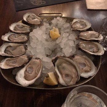 CW's Gin Joint - dozen oysters- Delish! -1 honey got to before I took the pick - Cocktail Bars Near Me - Tampa, Florida CW's Gin Joint - dozen oysters- Delish! -1 honey got to before I took the pick - Cocktail Bars Near Me - Tampa, Florida