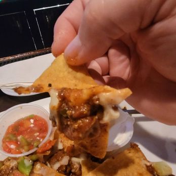 Elmo's Rock Bar & Grill - Chip pull. These chips are doing some heavy lifting - Bars Near Me - Boynton Beach, Florida