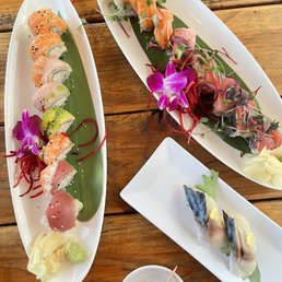 a variety of sushi dishes a variety of sushi dishes
