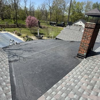 Raab and Sons Roofing & Sheet Metal - Rubber is the ultimate in low sloped roofing solutions - Roofing Near Me - Clio, Michigan Raab and Sons Roofing & Sheet Metal - Rubber is the ultimate in low sloped roofing solutions - Roofing Near Me - Clio, Michigan