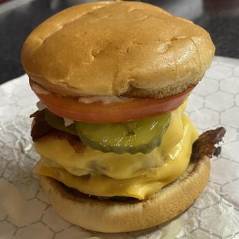 Poppy's Pizza - a cheeseburger on a bun - Pizza Near Me - Lloyd, Kentucky