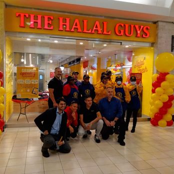 The Halal Guys - a group of people in front of a halal guys store - Middle Eastern Near Me - NE Washington, District of Columbia