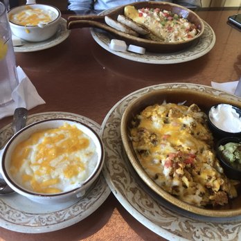 Another Broken Egg Cafe - Southwest scrambled eggs with cheese grits! This brunch spot never disappoints!! :-) - Breakfast & Brunch Near Me - Pembroke Pines, Florida