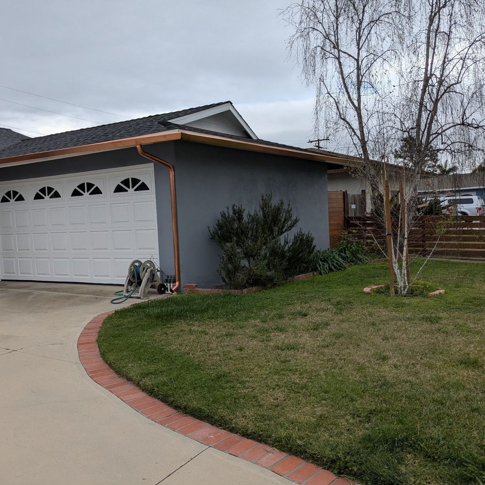 Anaheim Rain Gutter - With copper gutters and round drain pipe. - Gutter Services Near Me