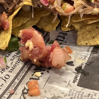 Copperz Brewing - Chunk of undercooked bacon on pork nachos. - Brewpubs Near Me - Hamburg, Pennsylvania Copperz Brewing - Chunk of undercooked bacon on pork nachos. - Brewpubs Near Me - Hamburg, Pennsylvania