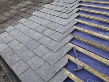 Slide of Deluxe Roofing