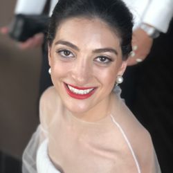 Elle Salon & Spa - love our bride with natural makeup and chignon.
