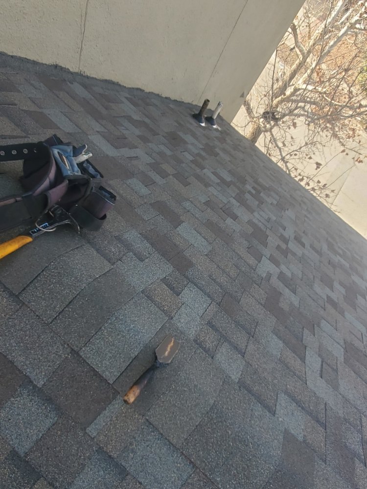 Slide of El Paso Roofing 915