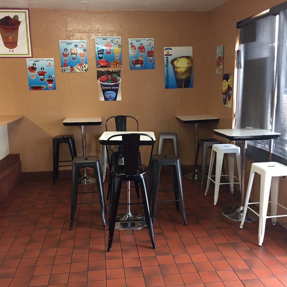 Raspados Cuchy's - tables and chairs in a restaurant - Shaved Ice Near Me - Yuma, Arizona Raspados Cuchy's - tables and chairs in a restaurant - Shaved Ice Near Me - Yuma, Arizona