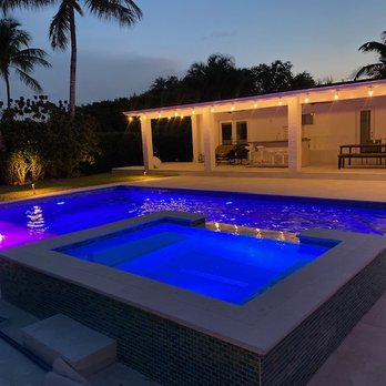 Statewide Homes - a swimming pool at night - General Contractors Near Me